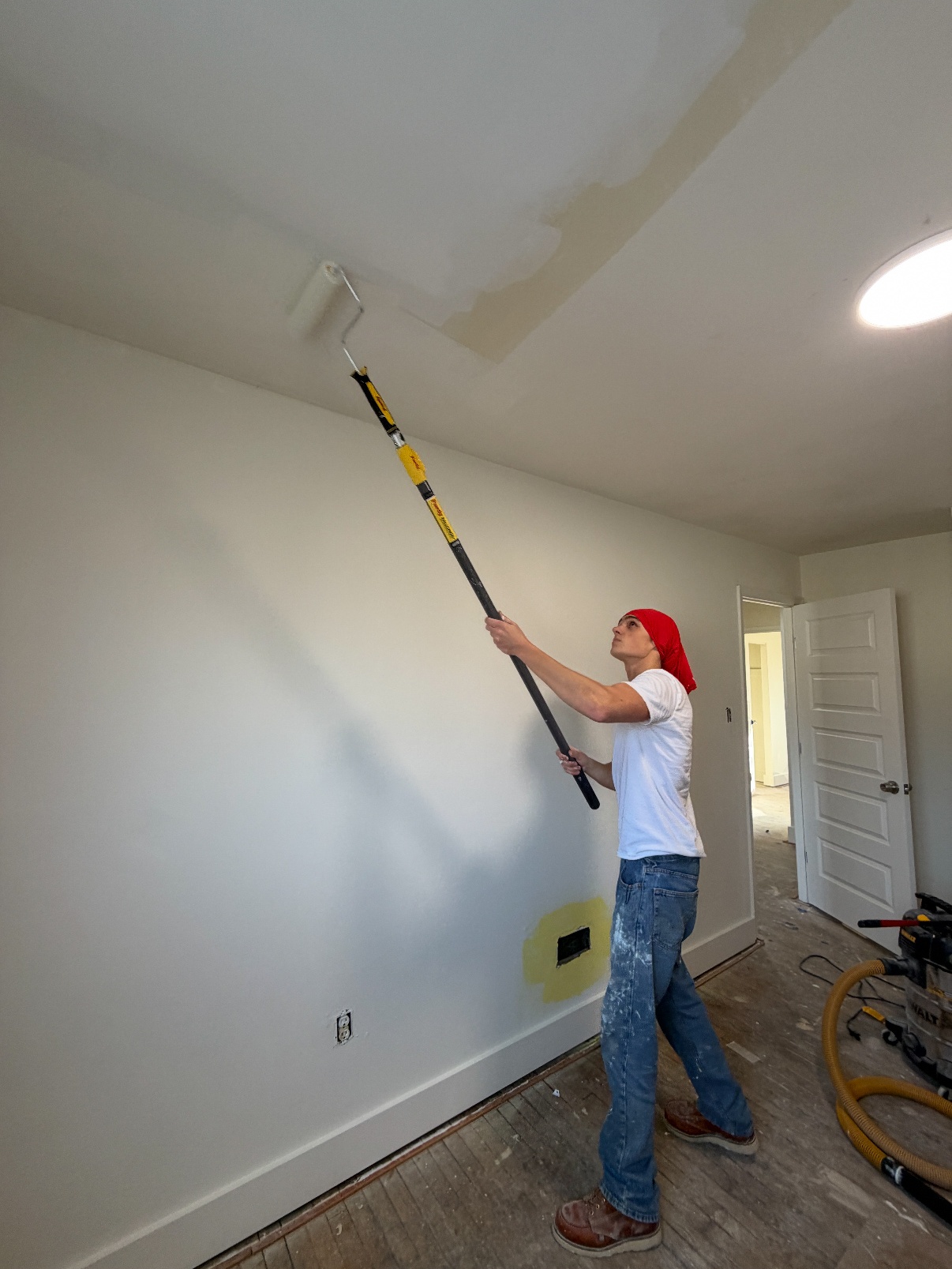Tideline Co. team member painting and finishing work